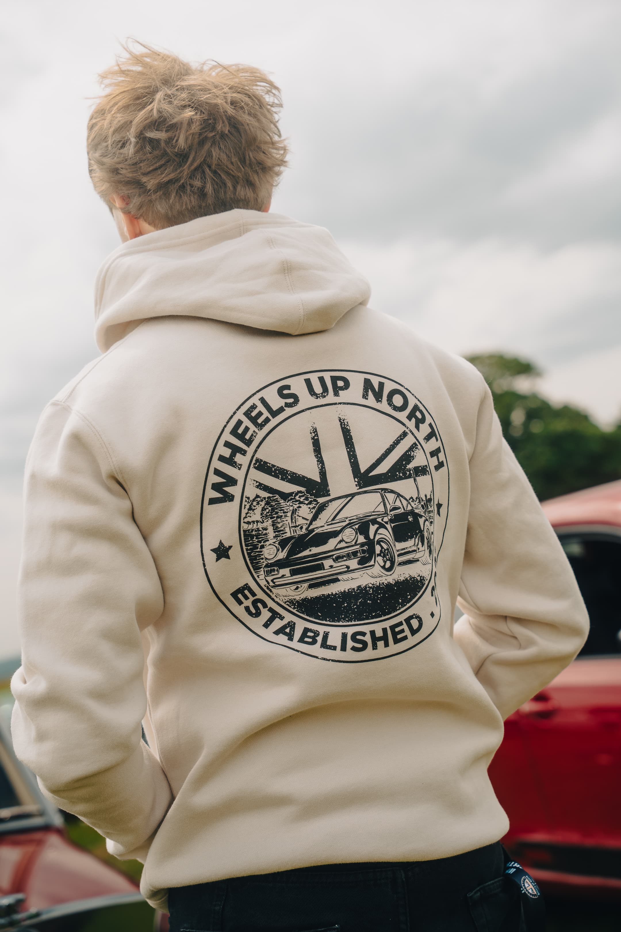 Grass 'Routes' Hoodie - Bone - close-up of the grass 'routes' back print on the bone hoodie - a 964 porsche over the union jack